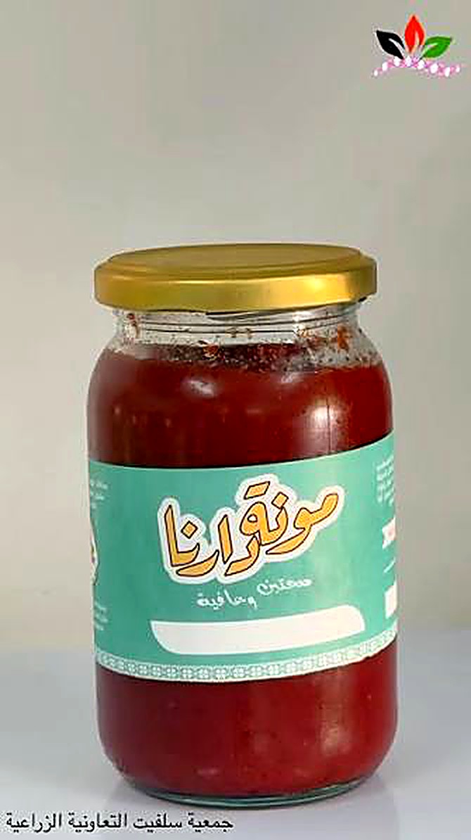 A jar of Mouneh Darna tomato paste.